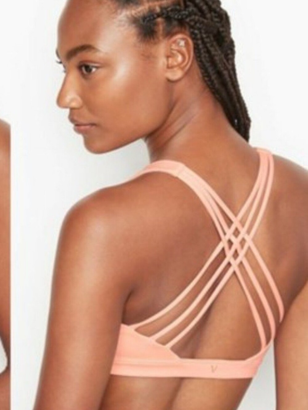 Victoria's Secret bralette features a distinct criss-cross strappy back design.